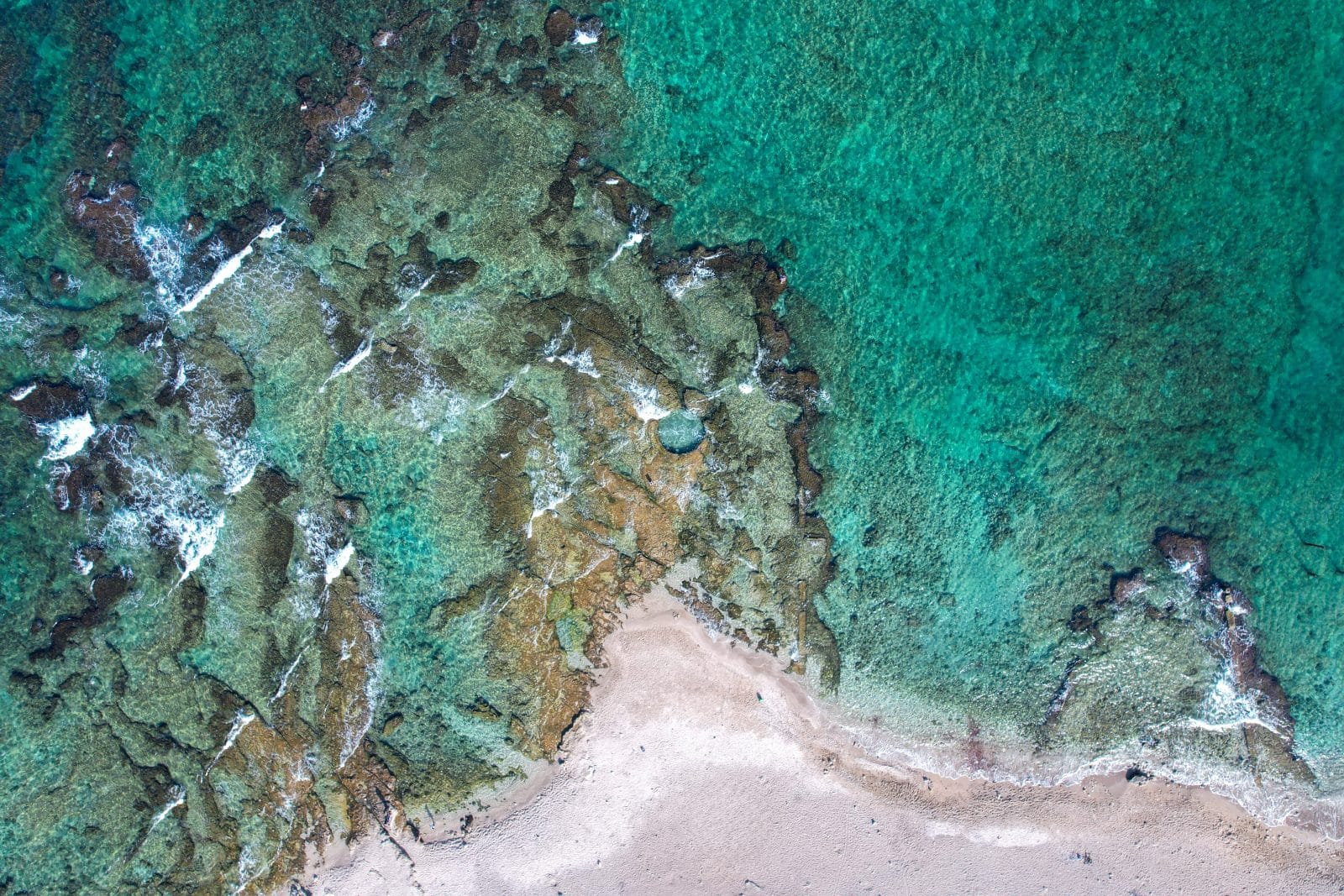 A natural pool is hewn in a natural rock near the shoreline of Haifa, Israel